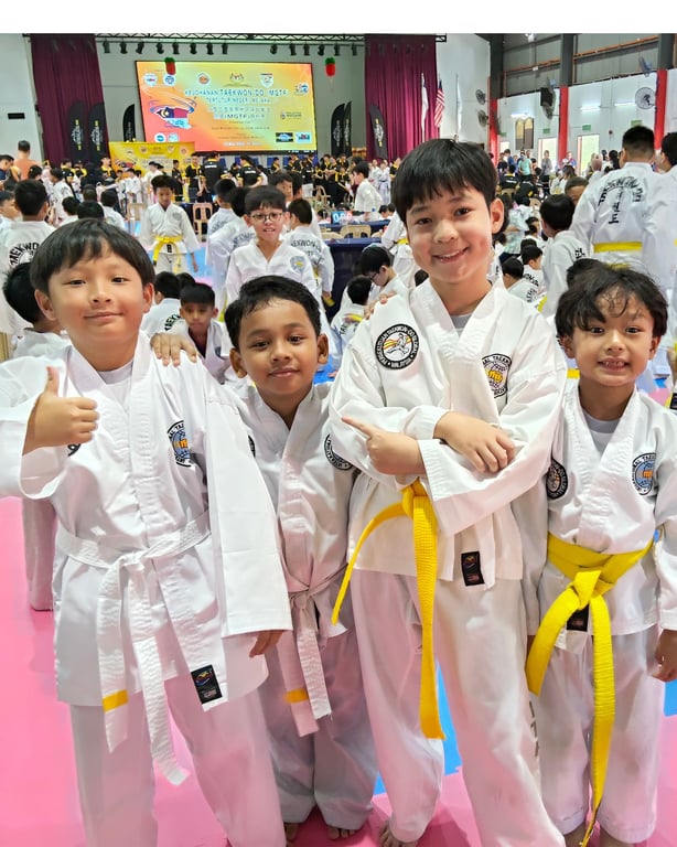 JTIS students participate in a regional Taekwondo meet, representing their school in skill and discipline.