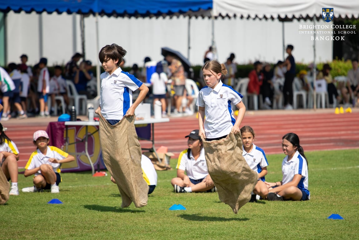 Key Stage 2 pupils giving their best in the sack race.