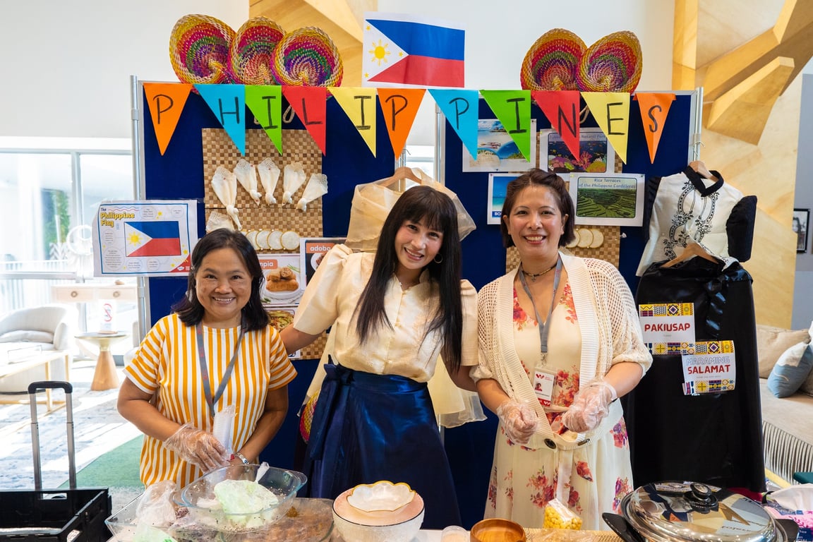 Parents and teachers helping run a stall at  International Language & Culture Fair
