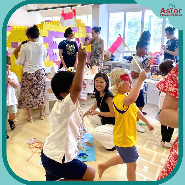 Students playing with their parents present in the classroom during a school event