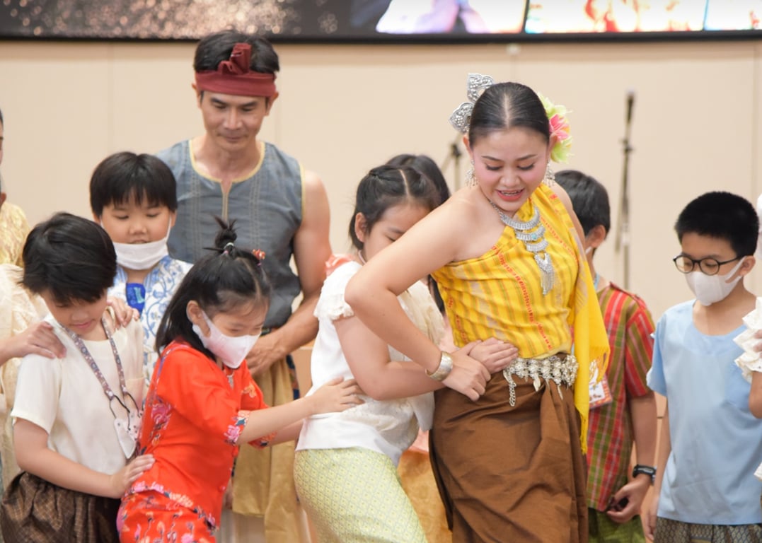 Parents and students celebrating Thai Culture Day with Traditional Dance and Festive Activities.