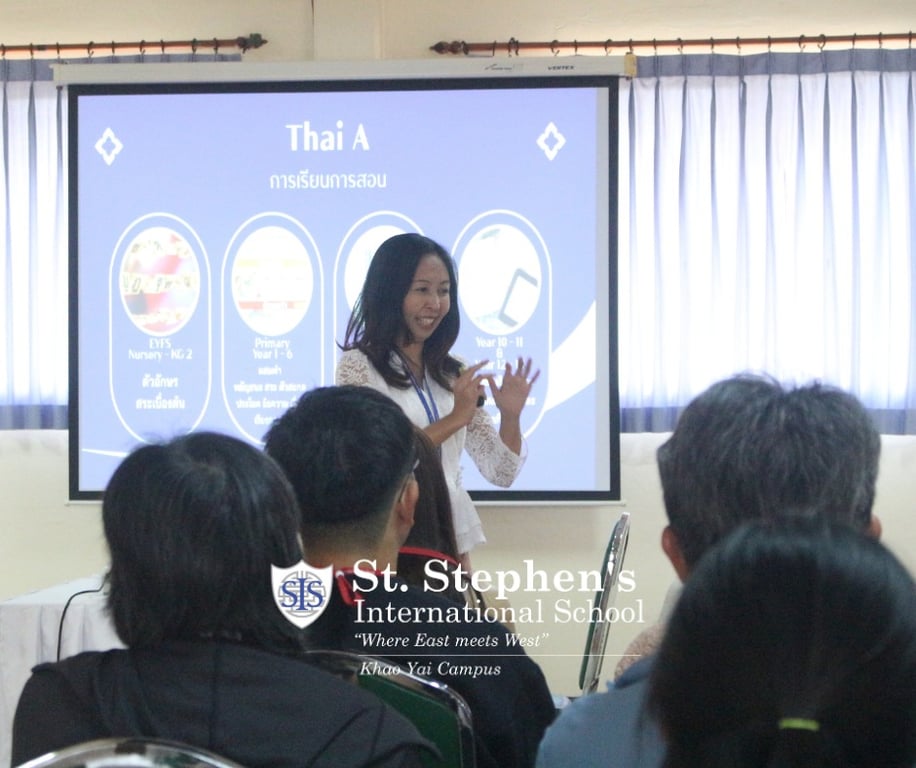 Parents learning about updates to Thai and Mandarin curriculum.