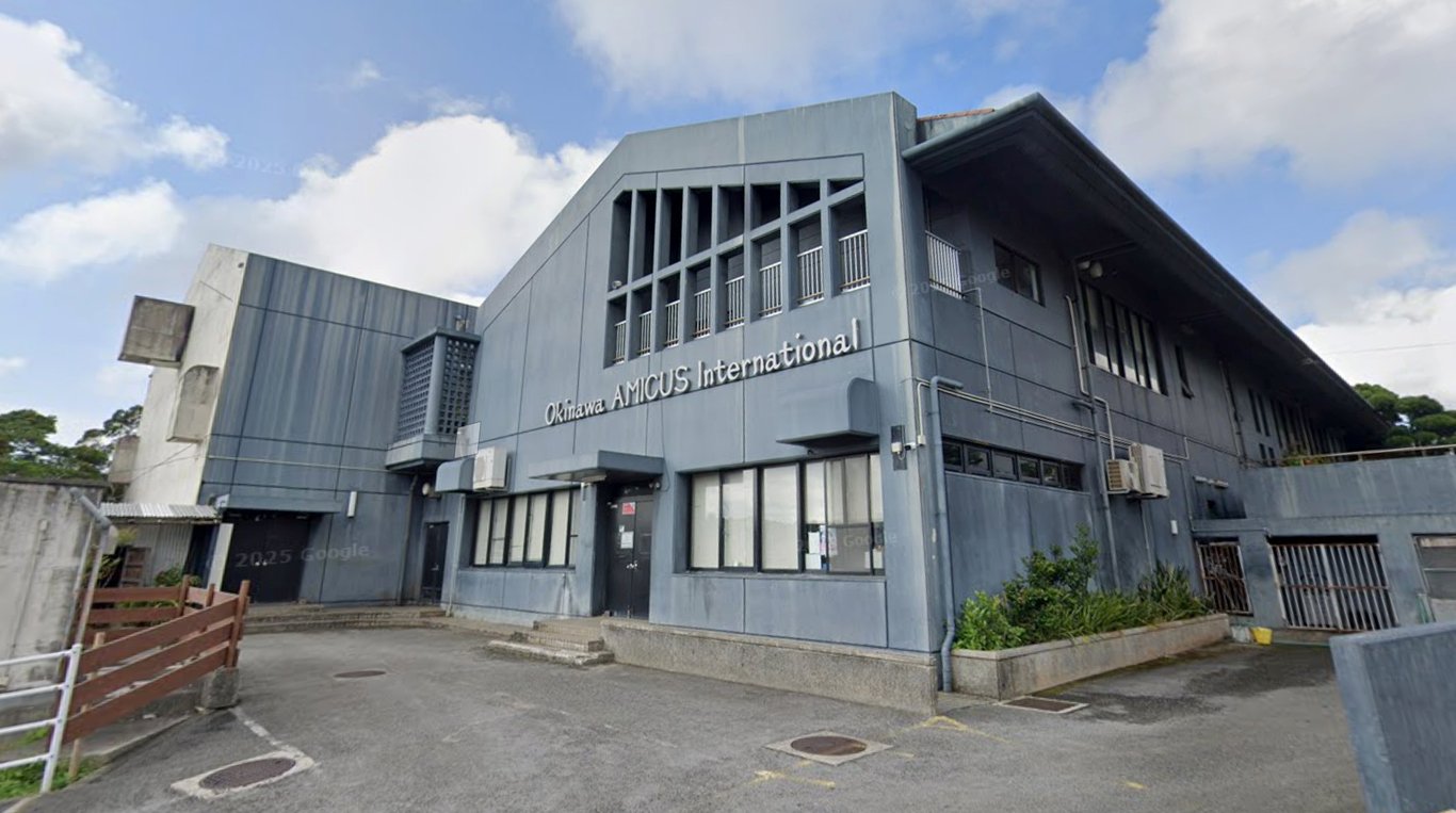 The primary academic building and entrance of Okinawa AMICUS International.