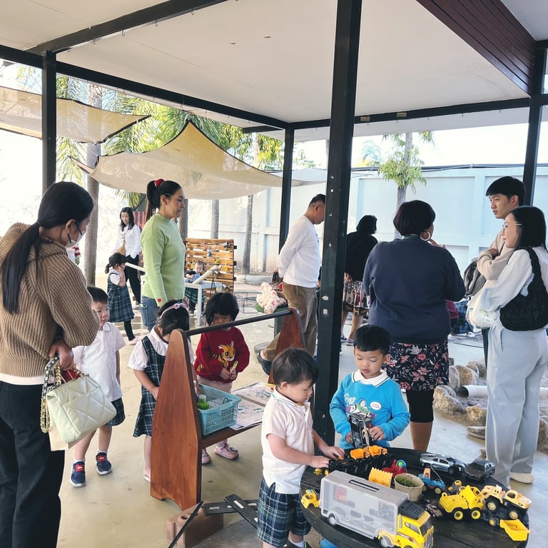Families at a stay and play session organized by the school.