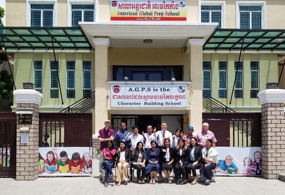 Staff and Teachers at the welcoming entrance of American Global Prep School.