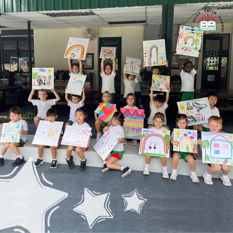 The Reception class show off their Artwork, which their parents helped them to create.