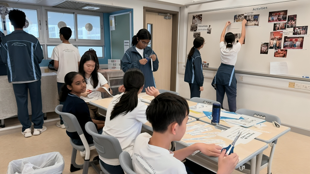 Classrooms buzz with collaboration and creativity as students engage in projects and  presentations.