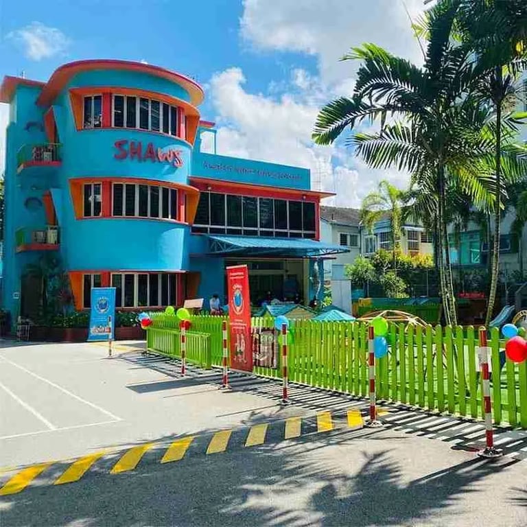 The colourful school building of the Mountbatten campus, with the outdoor playground visible