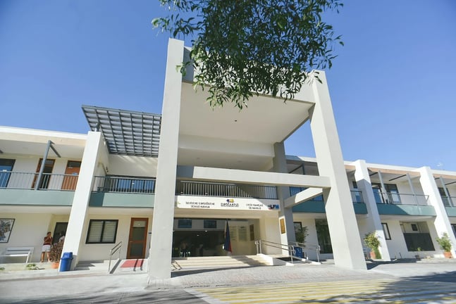 The modern main entrance and primary academic building of the German European School Manila.