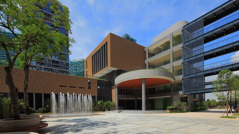 Fountain and entrance plaza at the Shen Wai International School campus.