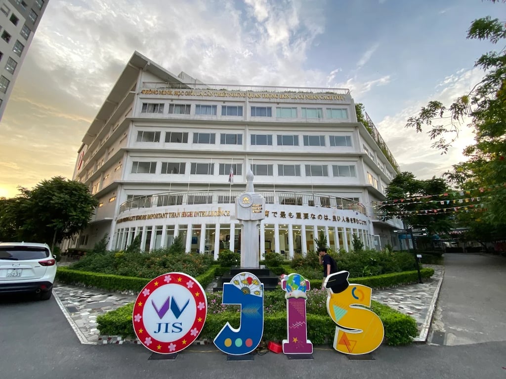 Evening scene outside the Japanese International School Hanoi campus entrance.