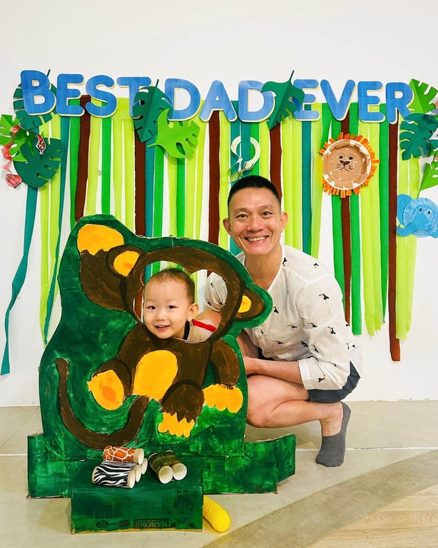 Father and son posing during the Father's day celebration at MLH.