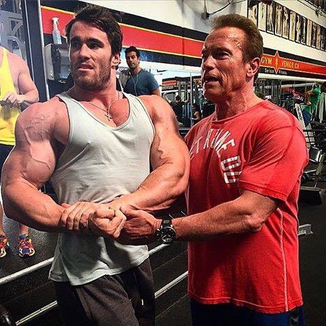 Arnold Schwarzenegger Helping Fitness Influencer Calum Von Moger Pose