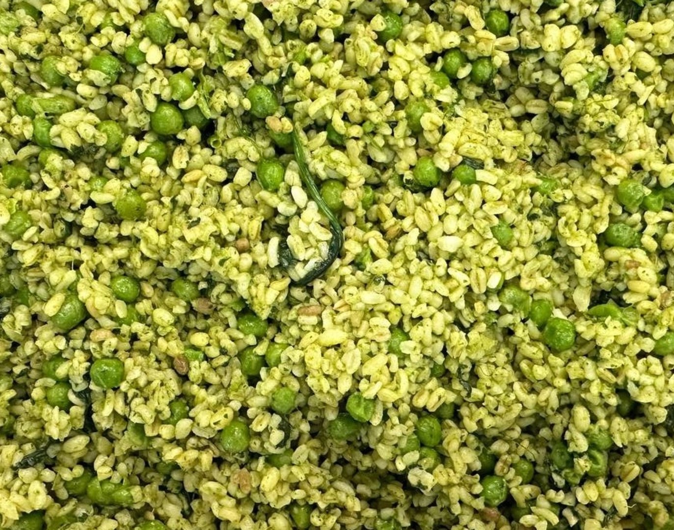 Photo Bulgur with green peas, spinach, Green Staff sauce