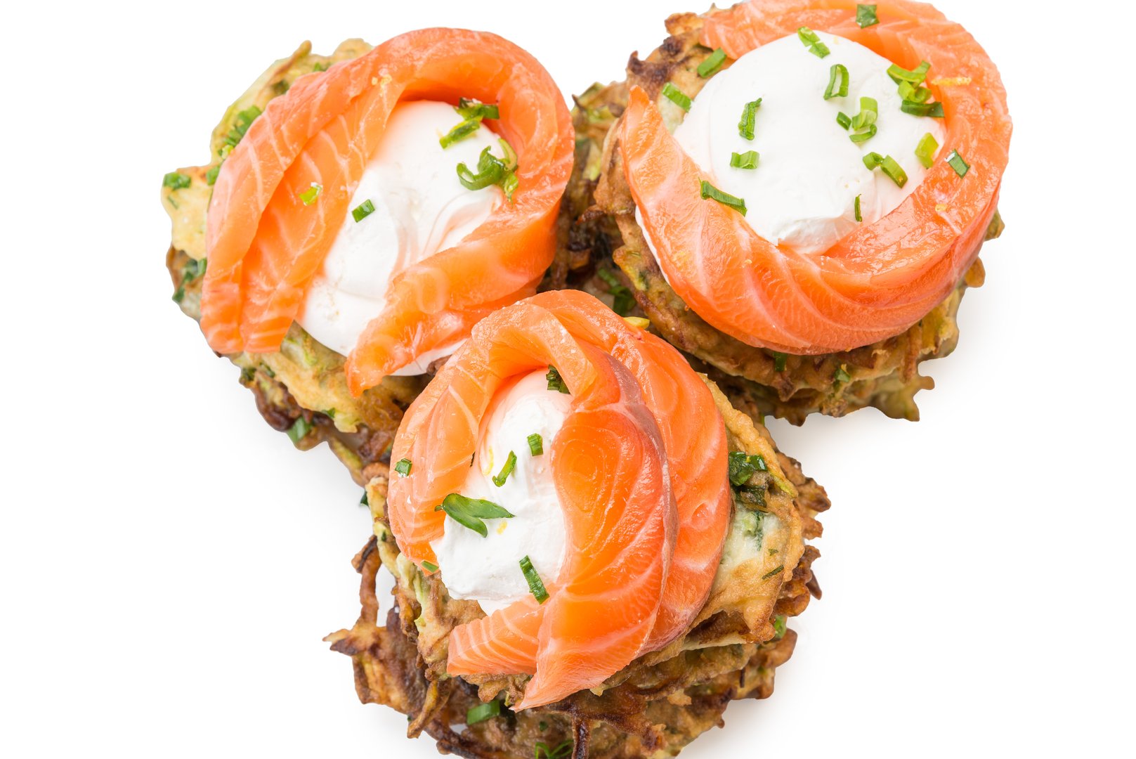 Photo Zucchini fritters with lightly salted salmon and cream cheese