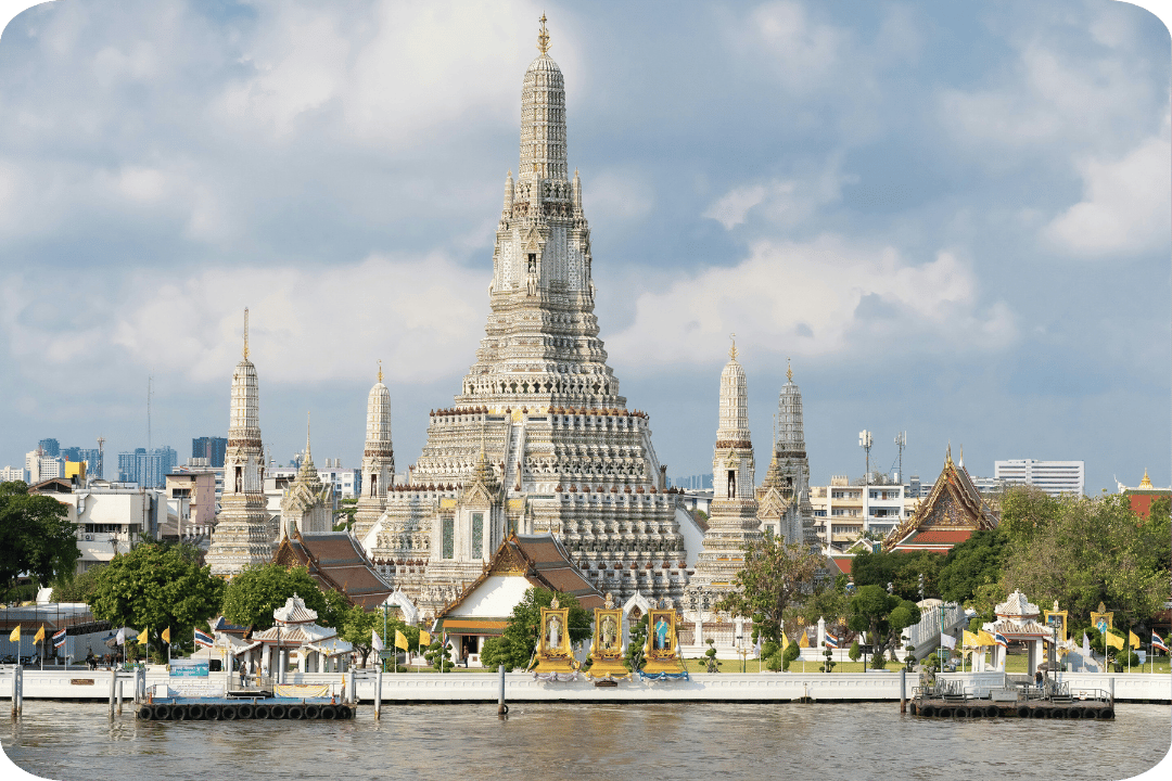 A tall white temple with intricate detailing.