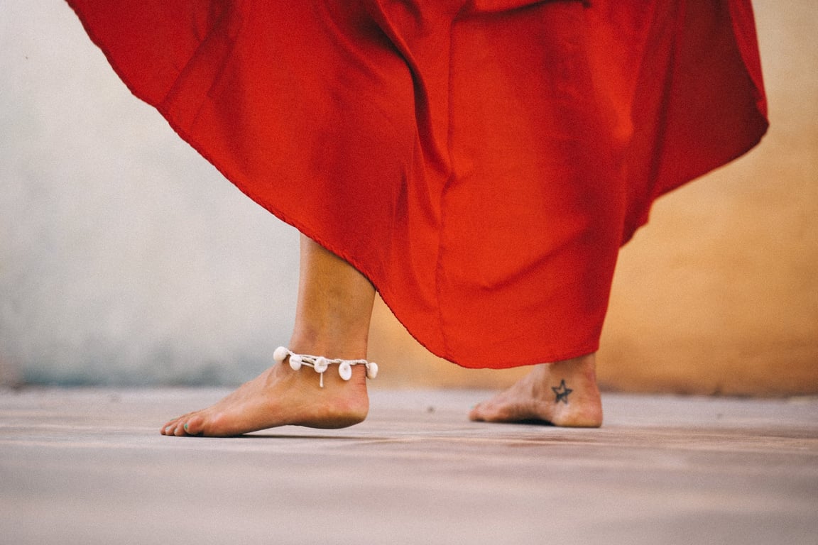  Photo Of a Bare Feet With Ankle Accessory