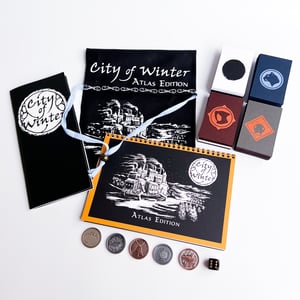 City of Winter: Atlas Edition RPG set with cards, booklet, coins, pouch, and die.