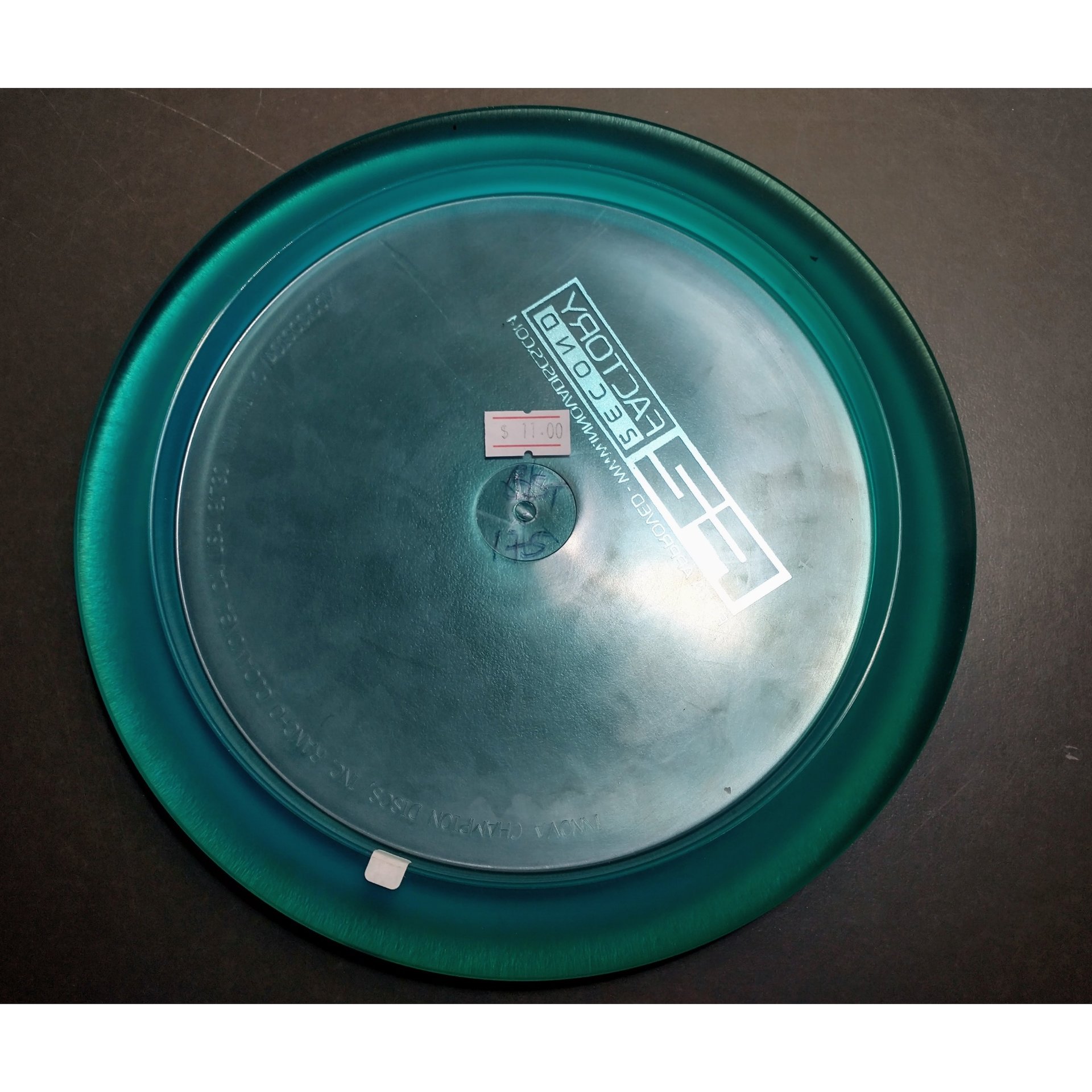 new Champion Beast Innova Disc Golf distance driver 175 red on green