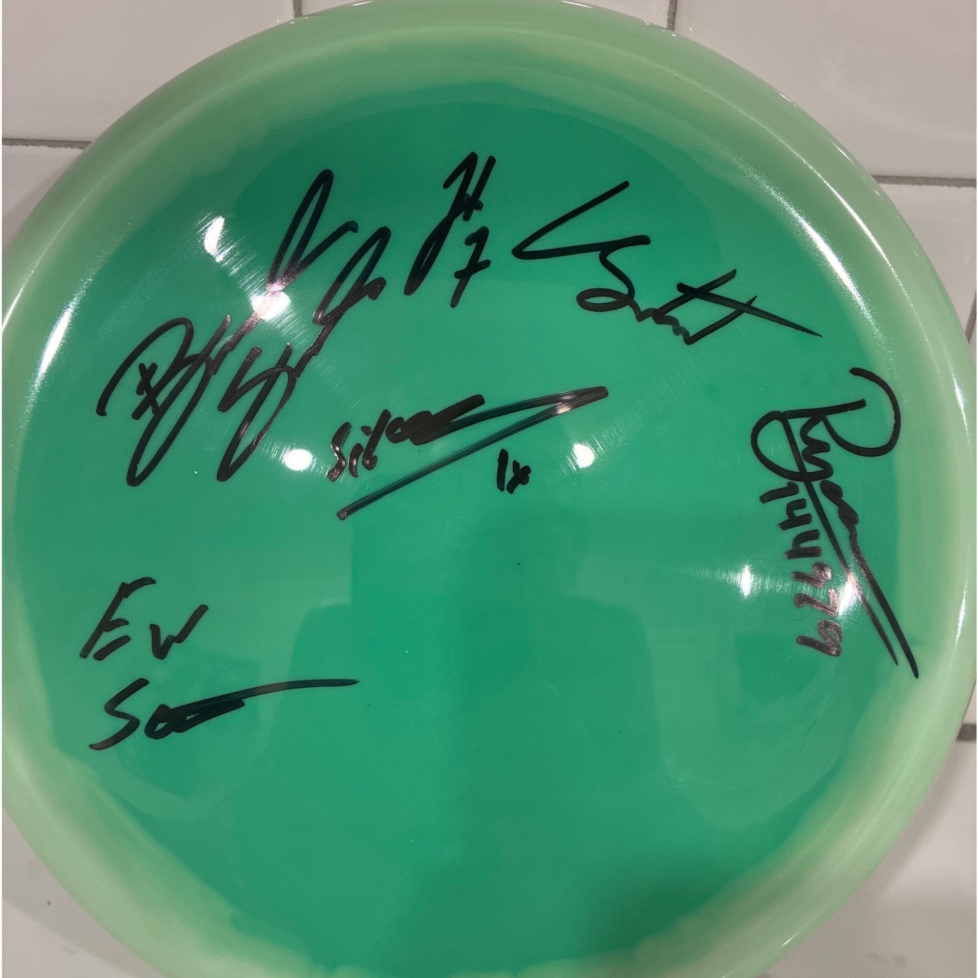 B-Side Glo-Berg signed by the 2026 Champ