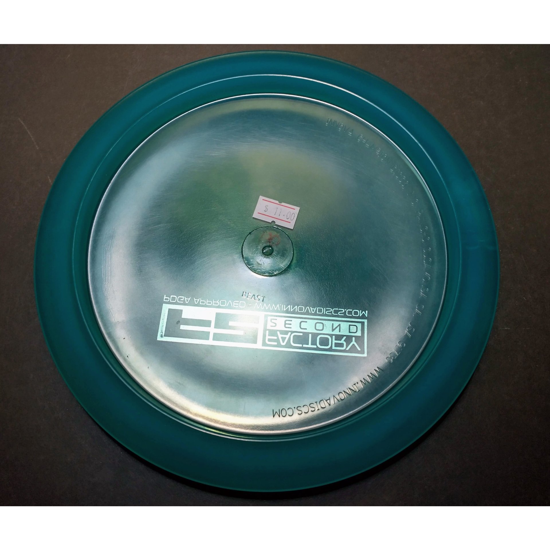 new Champion Beast Innova Disc Golf distance driver 170 red on green