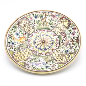 Coimbra decorative plate hand-painted Portuguese porcelain with intricate floral and animal motifs detailed view