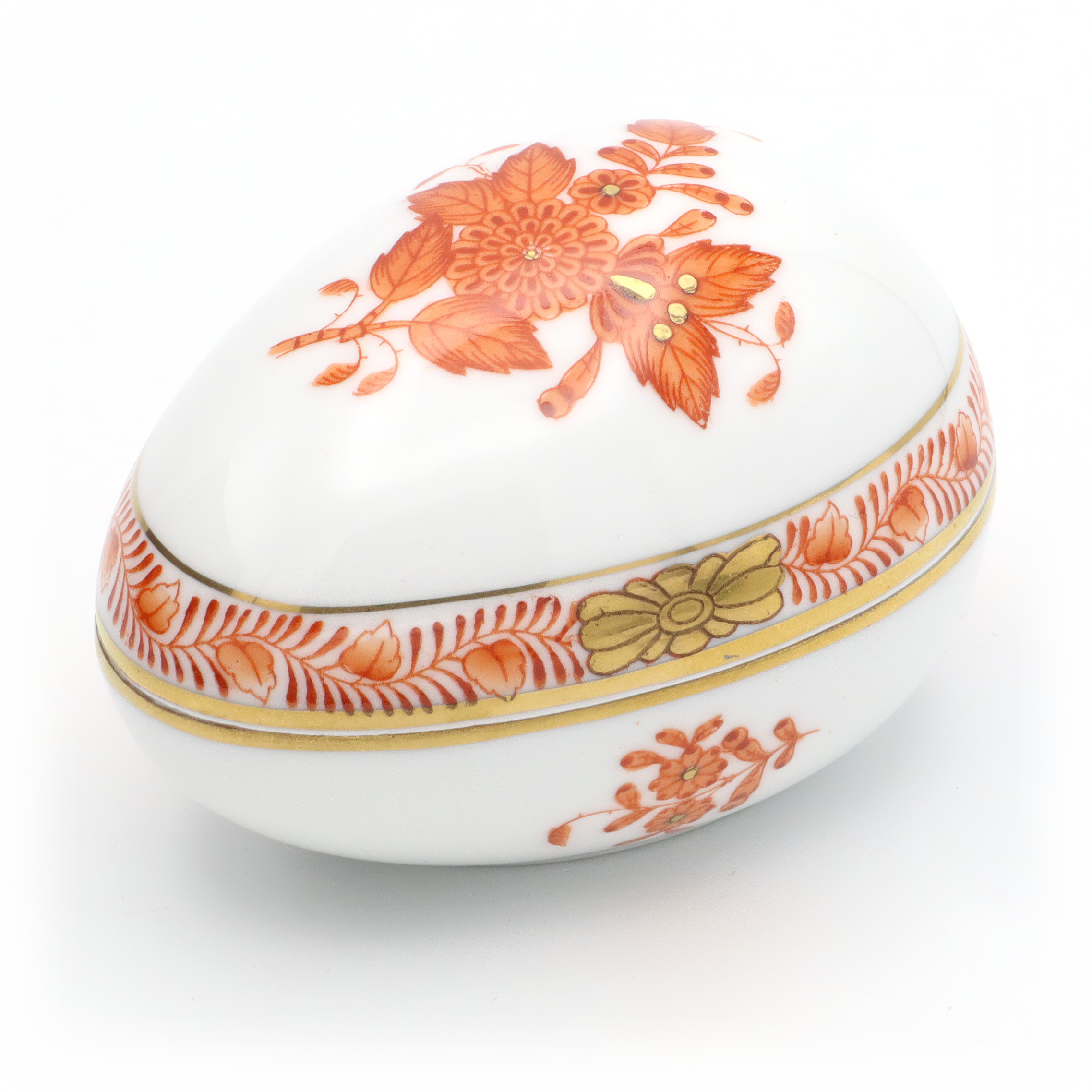 Herend egg shaped trinket box close up, Chinese Bouquet Rust Apponyi Orange pattern, hand painted vintage porcelain jewelry box