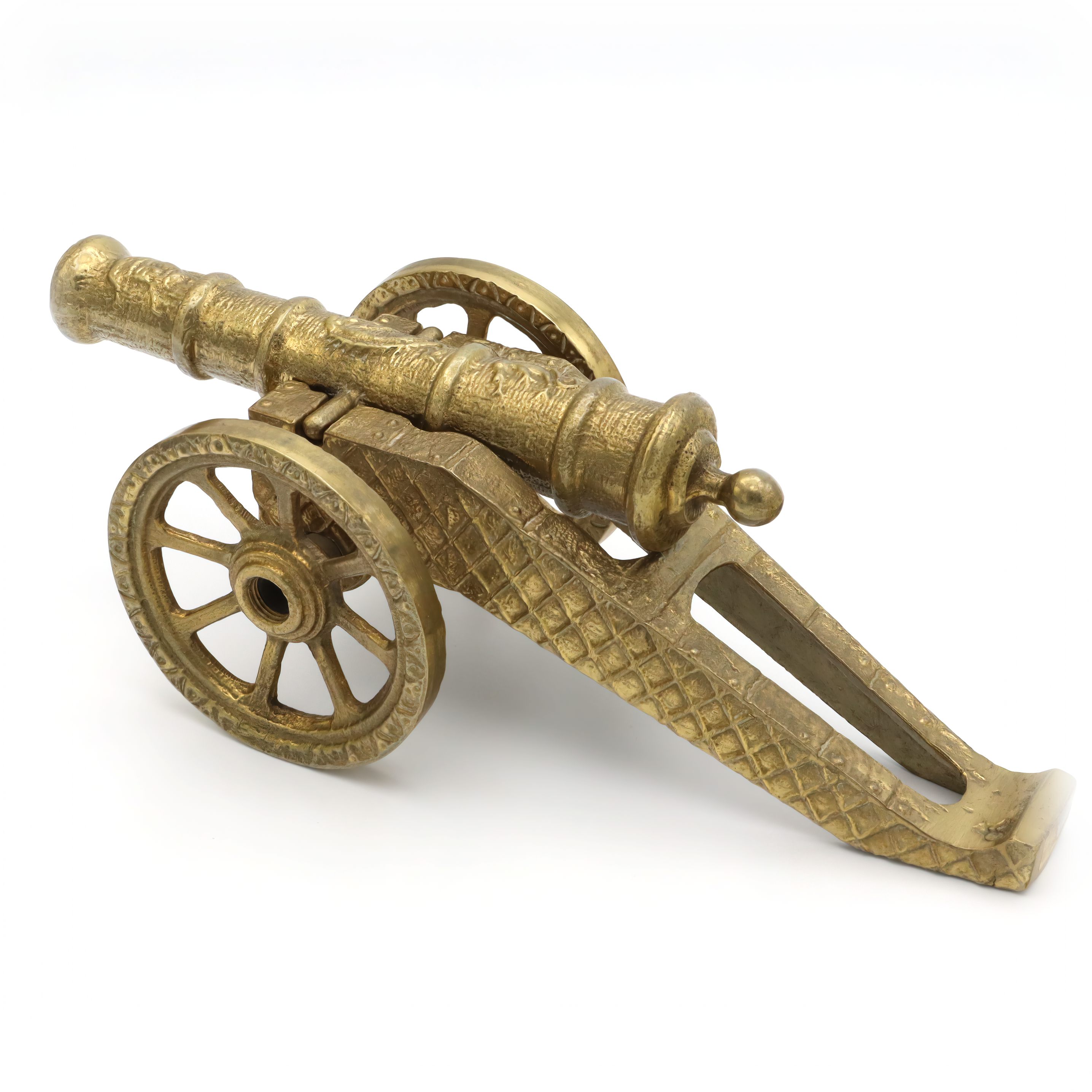 Bronze Cannon Statue Detailed View Bronze cannon statue detailed view showing intricate engravings and antique wheels on a white background