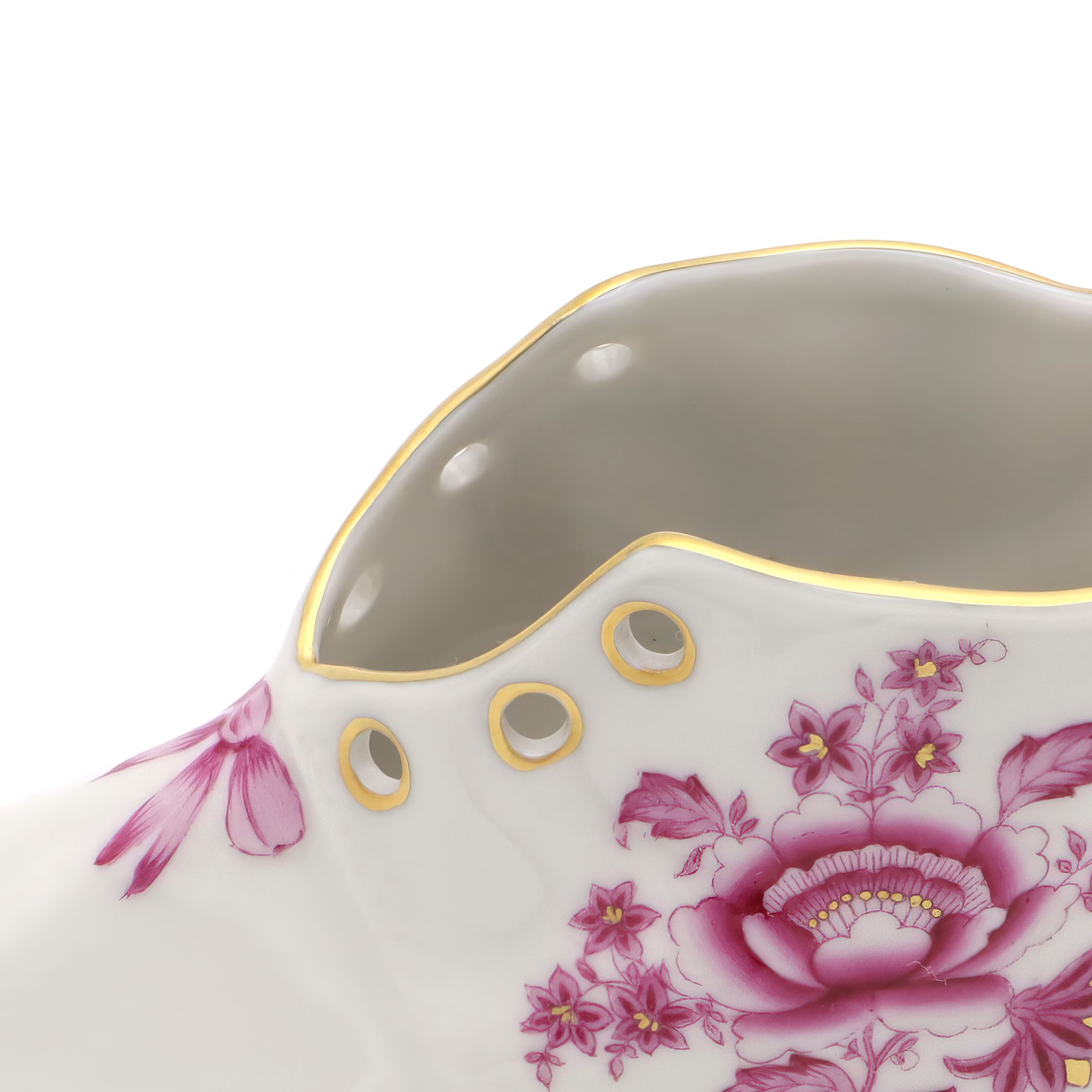 Herend Vintage Porcelain Baby Shoe close up with hand-painted floral design and gold trim