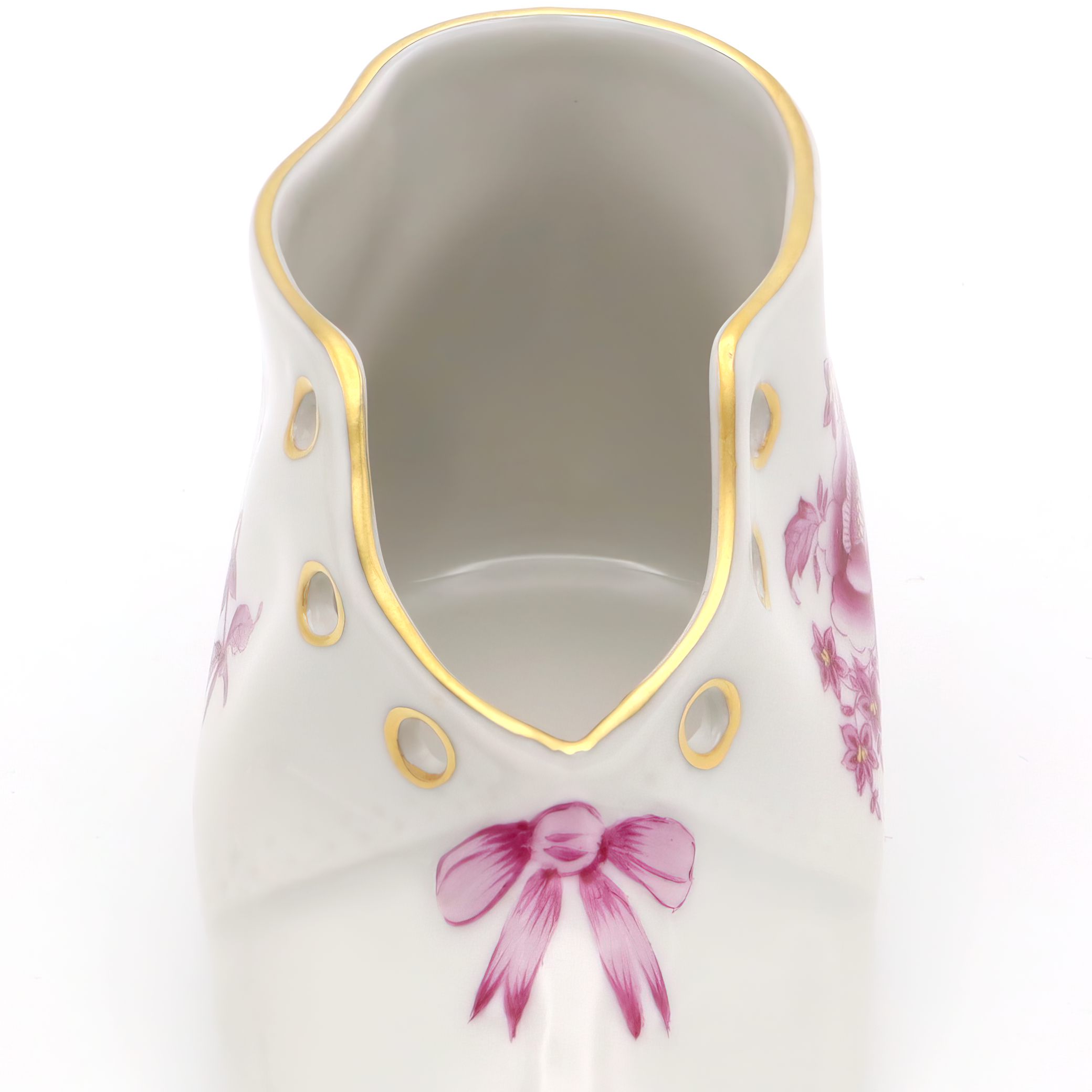 Herend vintage porcelain baby shoe close up with hand-painted pink floral design and gold trim