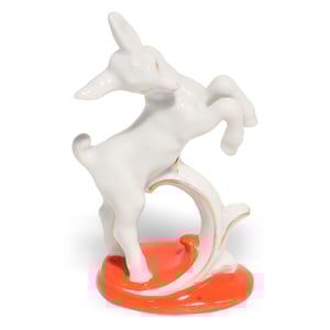 Wagner Apel porcelain fawn statuette on orange base, vintage collectible deer figurine detailed view