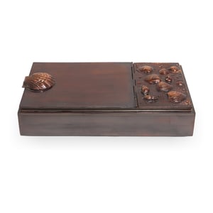 Bronze tobacco box with detailed shell motif, vintage decorative collectible container