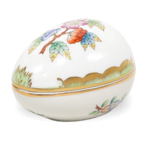Herend porcelain egg trinket box with hand painted floral pattern and gold accents
