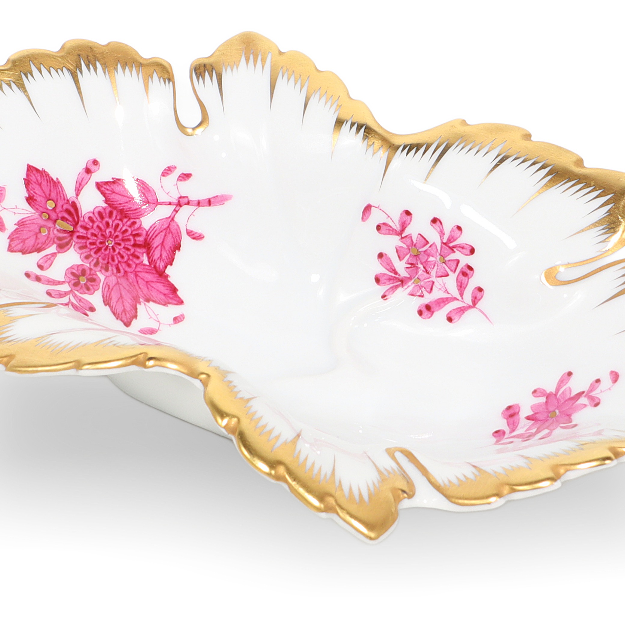 Luxury jewelry tray close up, porcelain dish with gold rim and pink floral pattern for elegant accessory display