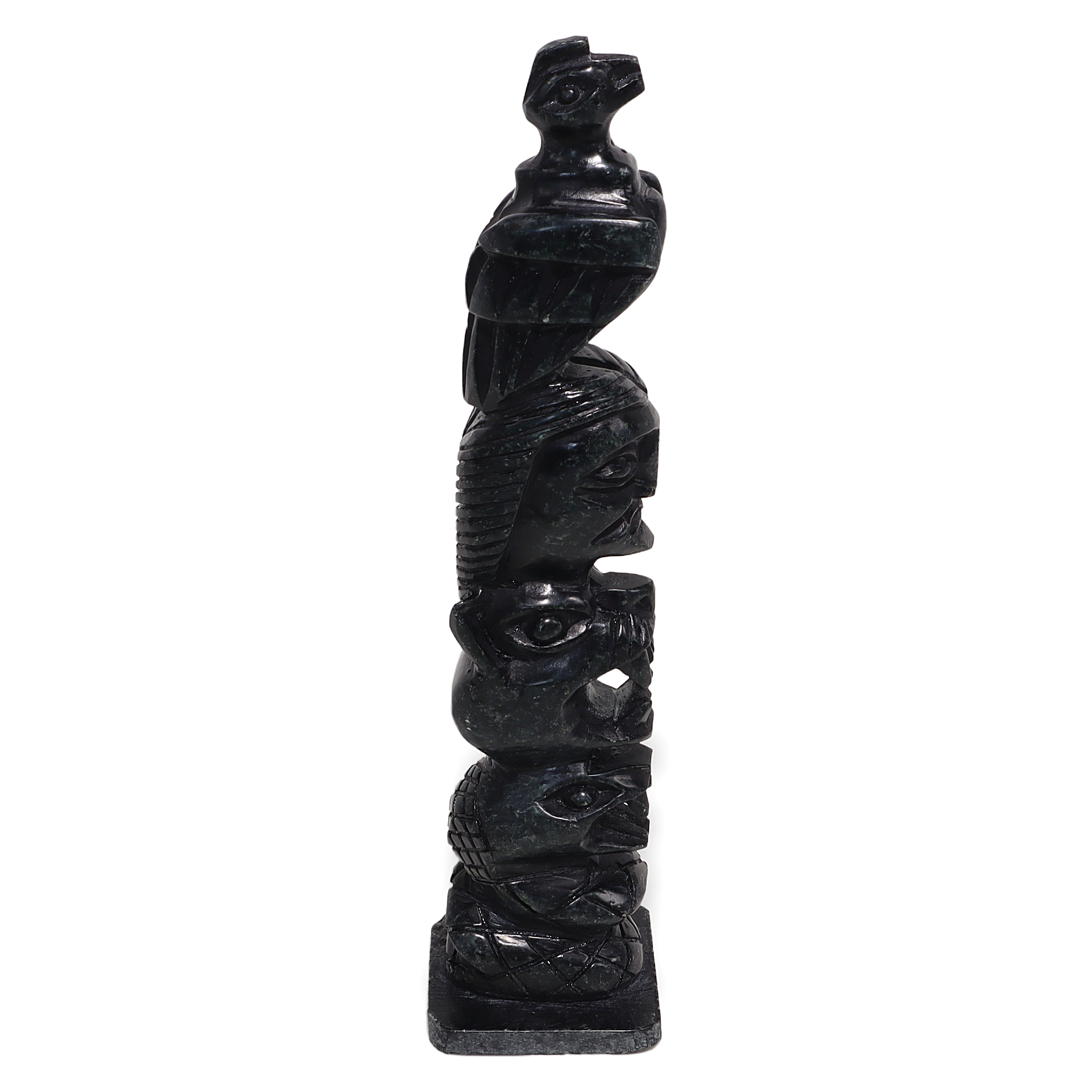Stone totem pole sculpture vintage hand-carved indigenous art detailed side view