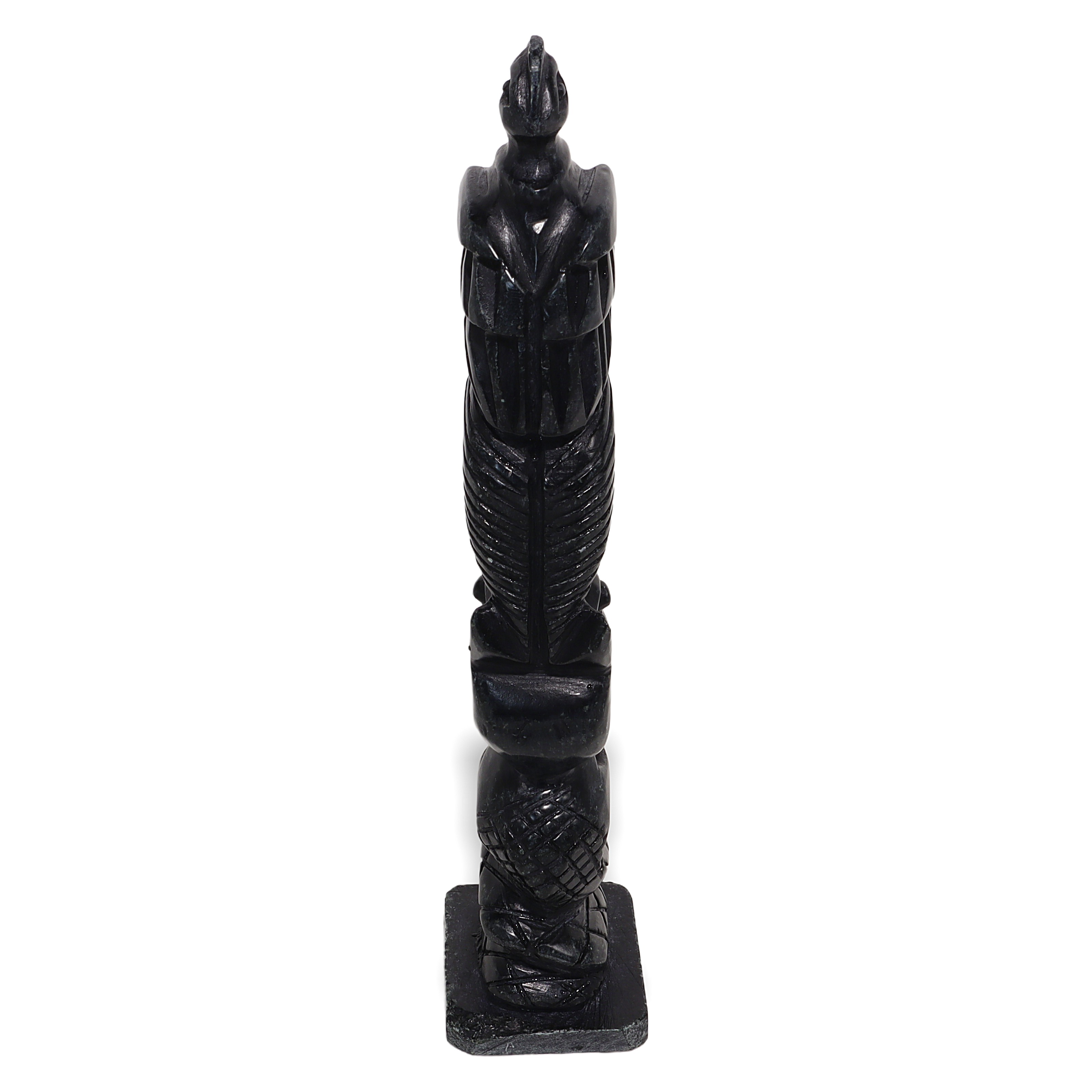 Stone totem pole sculpture vintage hand-carved tribal art full view on white background