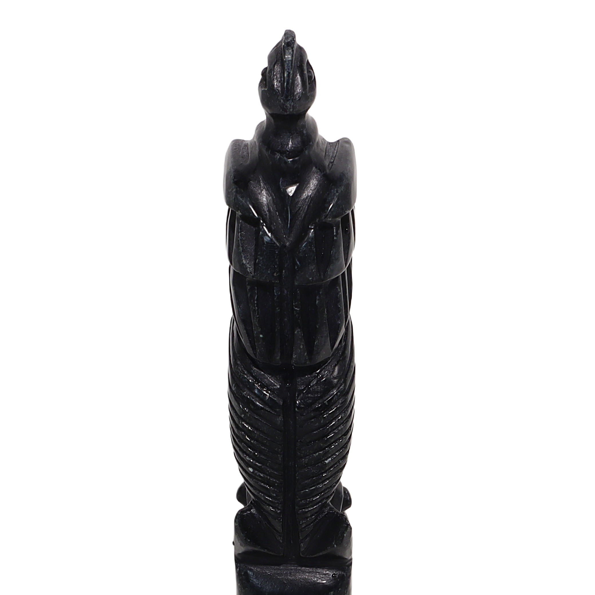 Stone totem pole sculpture close up, vintage carved tribal art statue detailed image