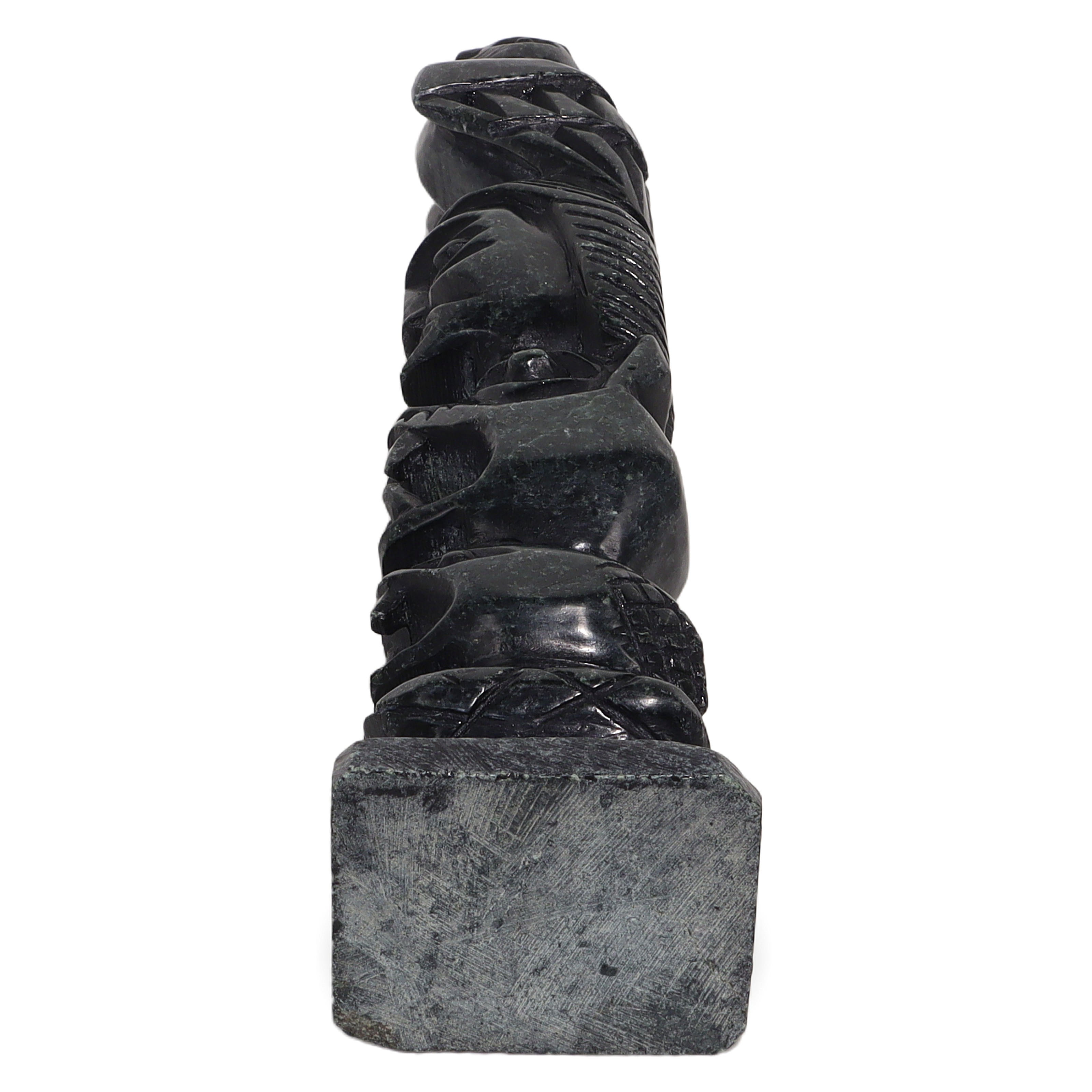 Stone totem pole sculpture base close up, vintage carved indigenous art detailed view