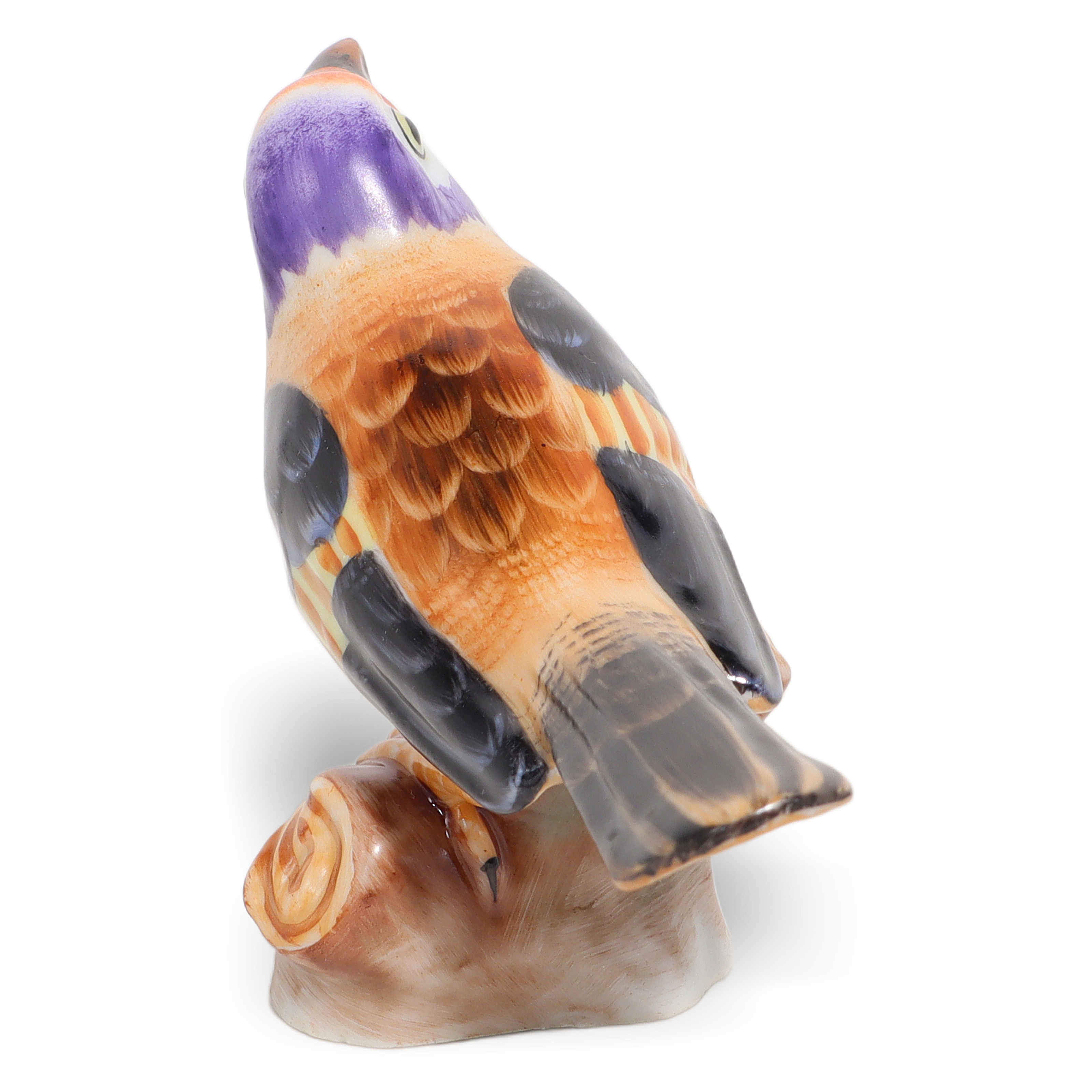 Herend bird figurine close up showing hand-painted porcelain feathers and vibrant colors