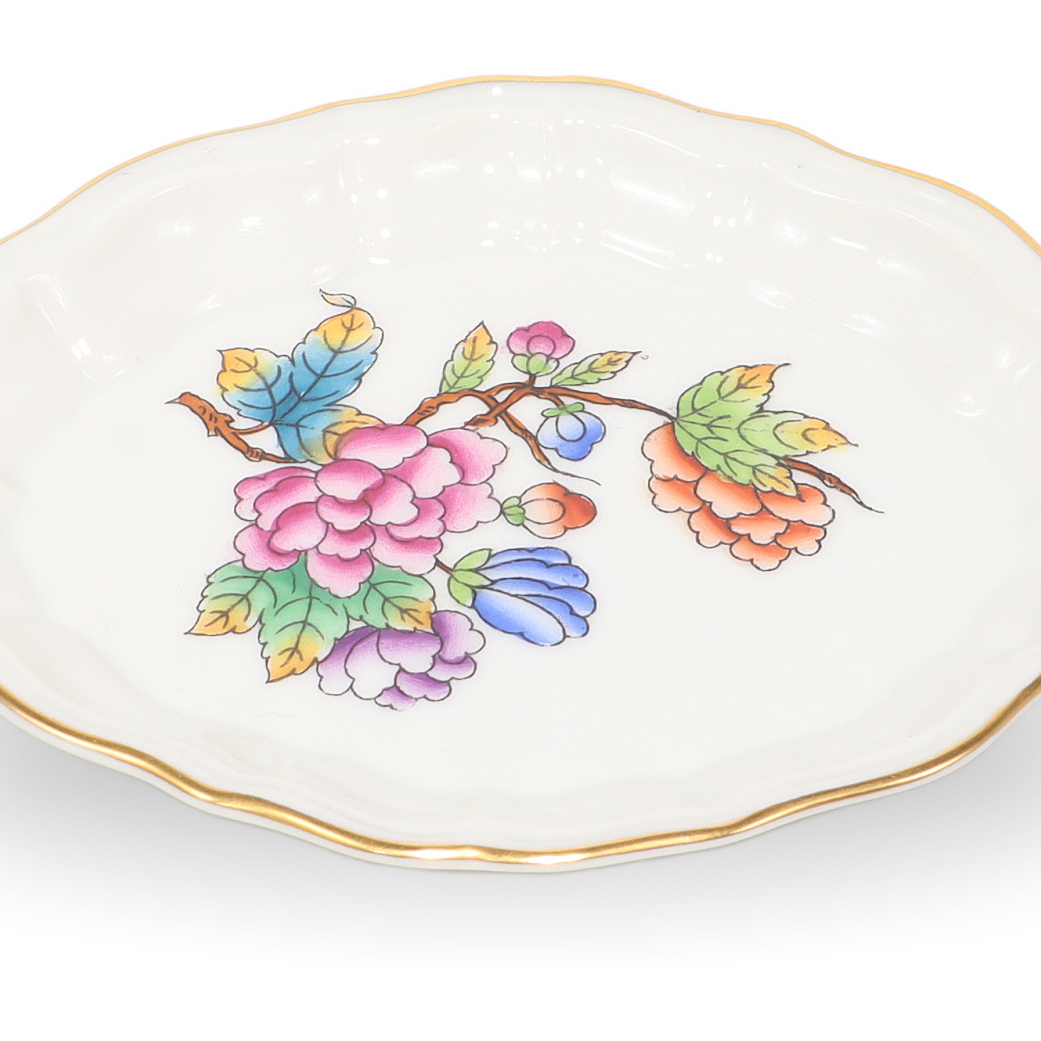luxury jewelry tray close up, porcelain tray with colorful floral design and gold rim for elegant accessory display