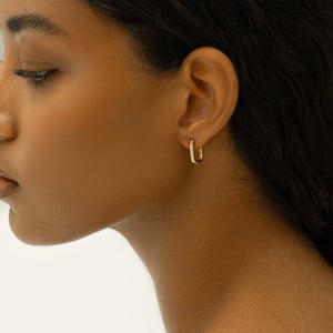 14K Gold Huggie Hoop Earrings by Sincere Sally product image