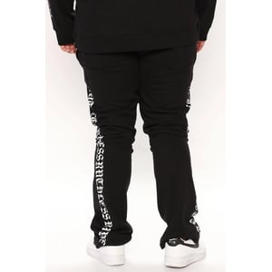 Stylish and Comfortable Men's Flare Sweatpants in Black by Fashion Nova product image
