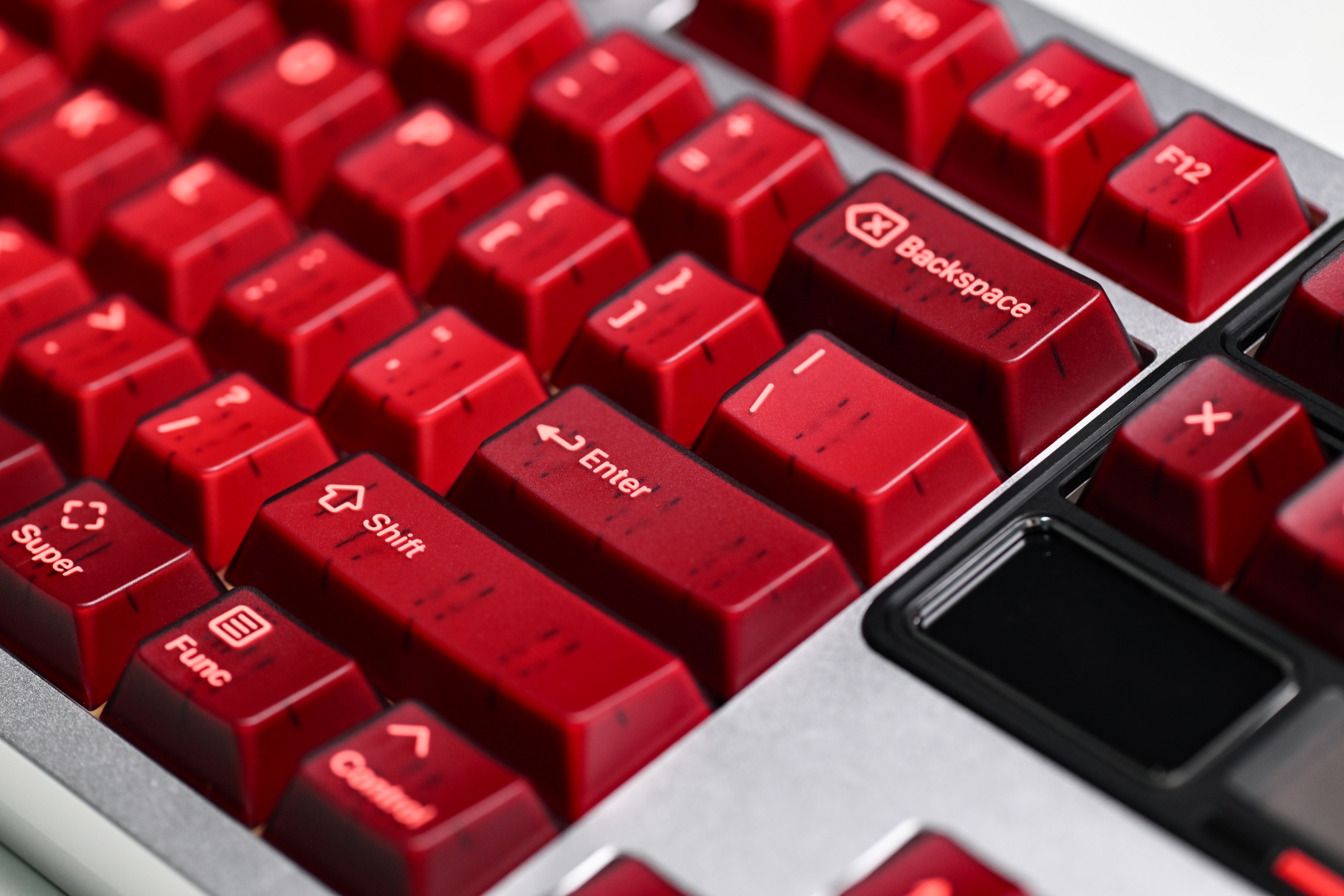 KAP Generation — a set of bright pink and translucent maroon keycaps image 6