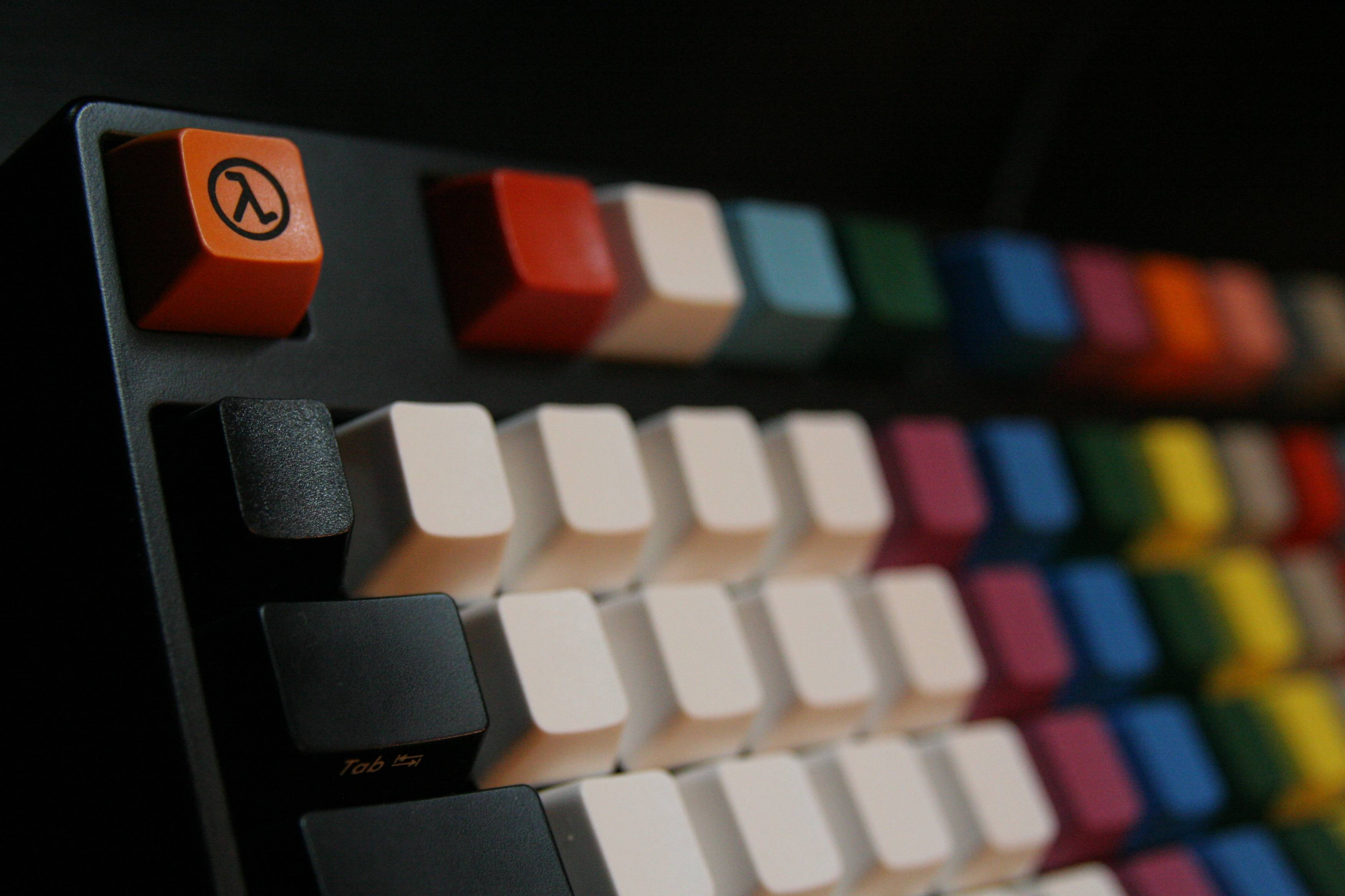 Orange Half life Lambda key from QWERKeys