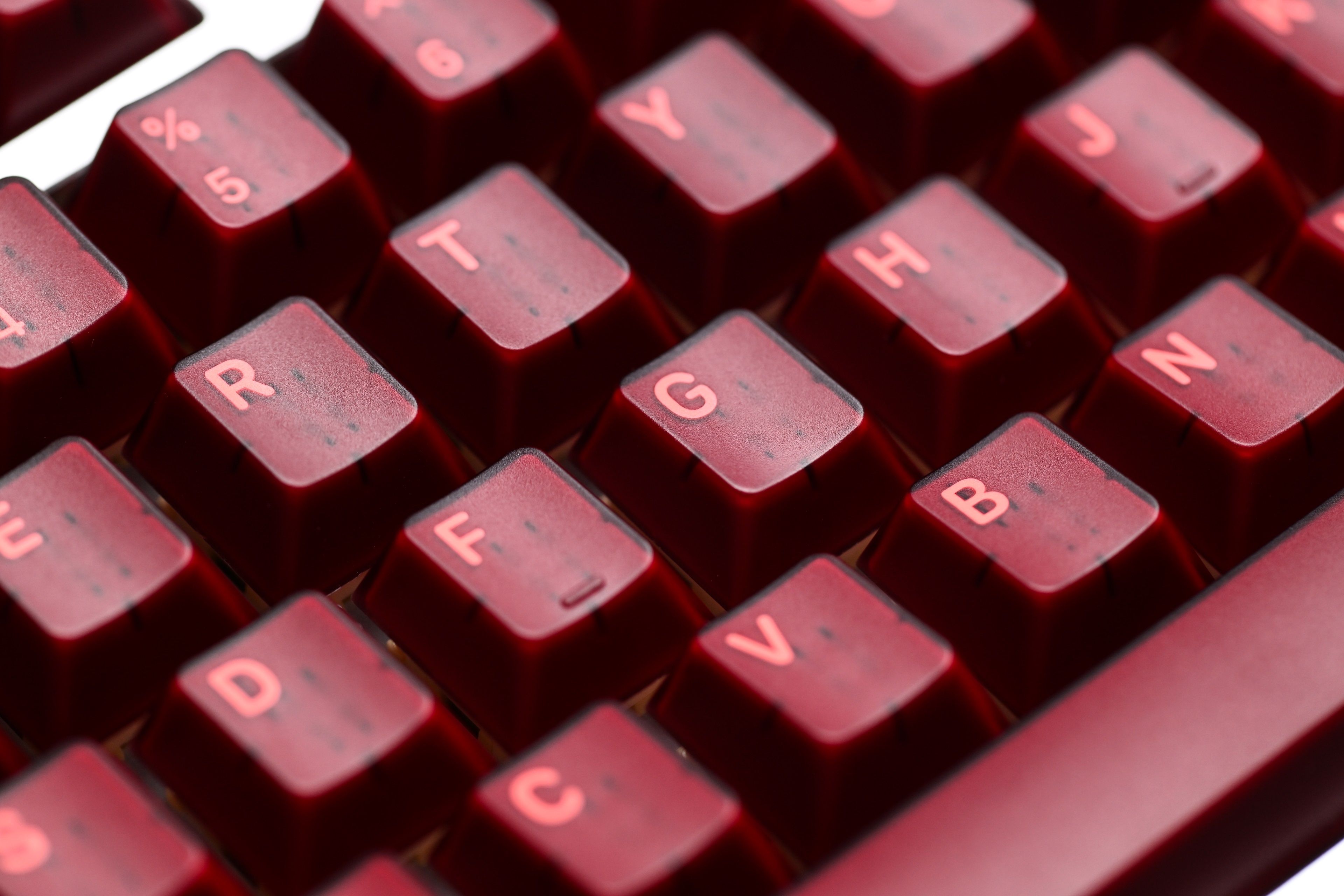 KAP Generation — a set of bright pink and translucent maroon keycaps image 7