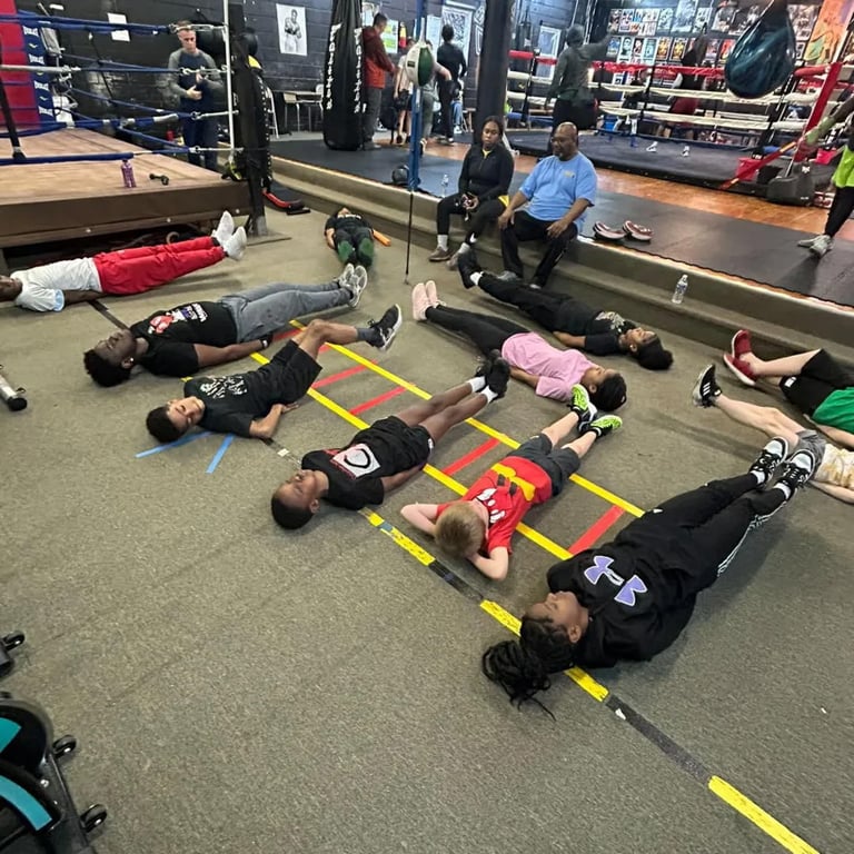 Young boxer learning the fundamentals at IBHK Boxing