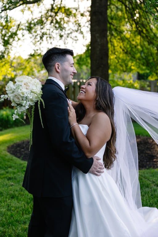 Couple laughing in embrace