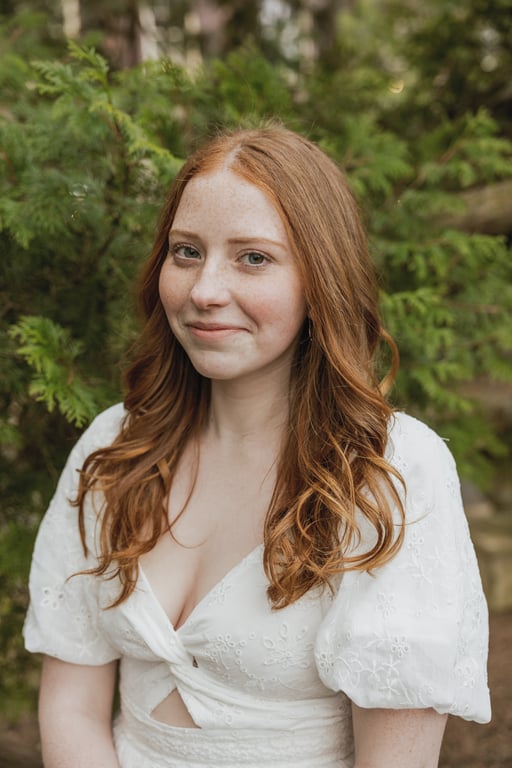 Portrait of young woman outdoors