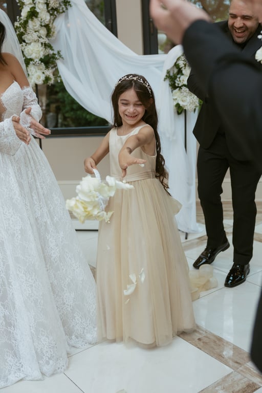 Flower girl tossing petals