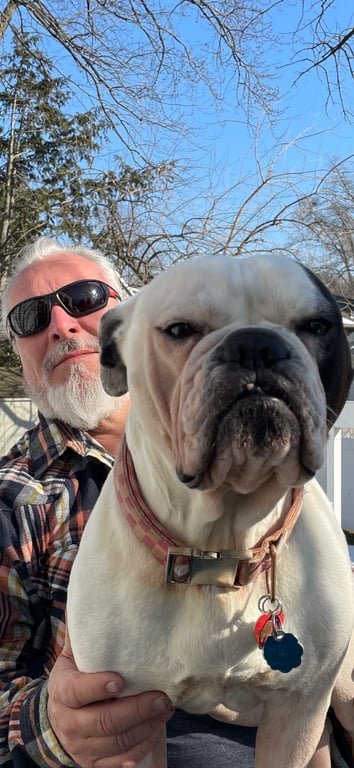 Chuck Loftus with Bella, Owner and Principal of Loftus Elite Roofing and GC Services